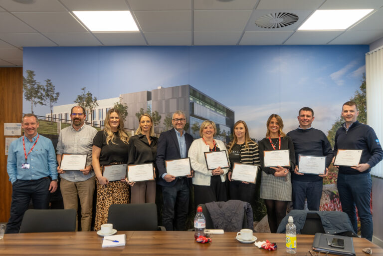 Leadership development training candidates after completing their course with certificates