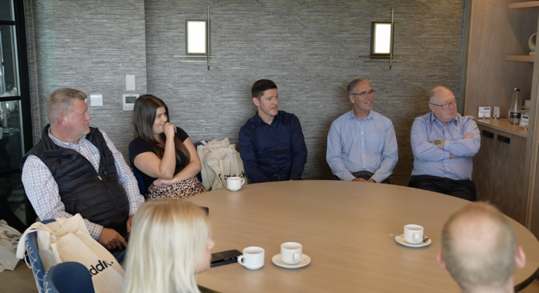 senior leadership team at caddick in a round table discussion